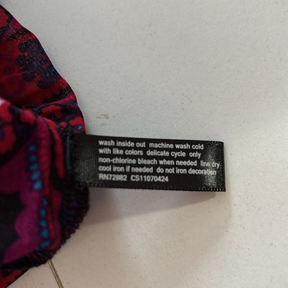 Red Patterned Top with Beaded Neckline. 3/4 length flared sleeves and flared hem - Picture 5 of 7